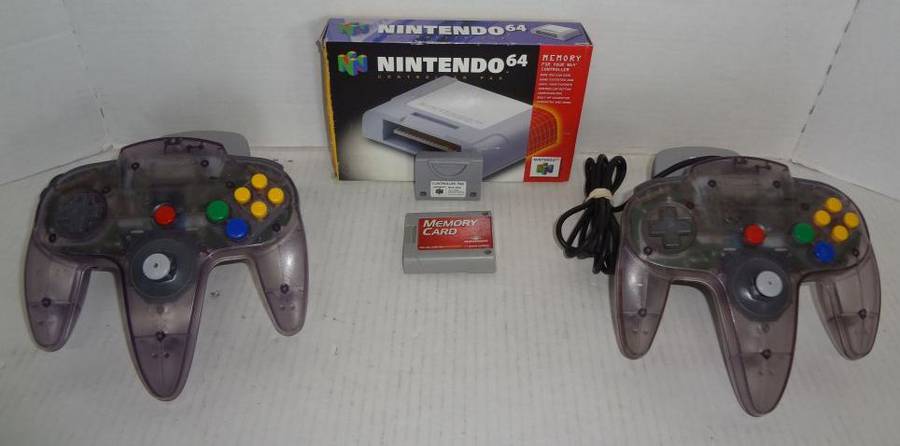 2) Nintendo 64 Controllers with NUS-019 Transfer Pak, Memory Card 