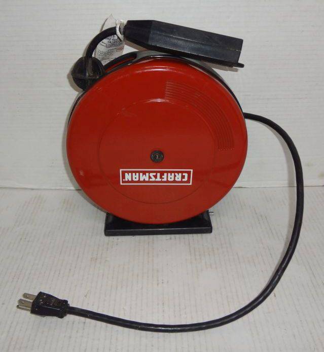 Red Metal Craftsman 30' Cord Reel, 125V 10 Amp 1250 Watts, 16 Gauge 3  Wires, Like New Condition, Works Good, Made of Steel and Plastic Model No.  83927, 9Diam Auction