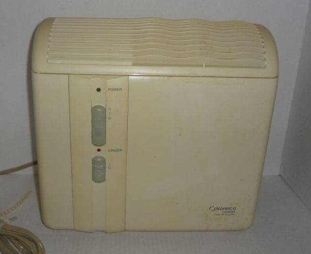 Norelco clean deals air machine