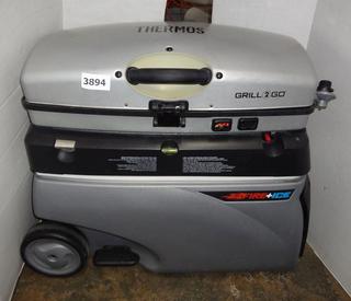 Thermos and Ice Grill 2 Go, Cooler And Griddle, Pops Up For Easy Cooking, 15"W x 29"L x 27"H, Very Good Condition Auction 1BID
