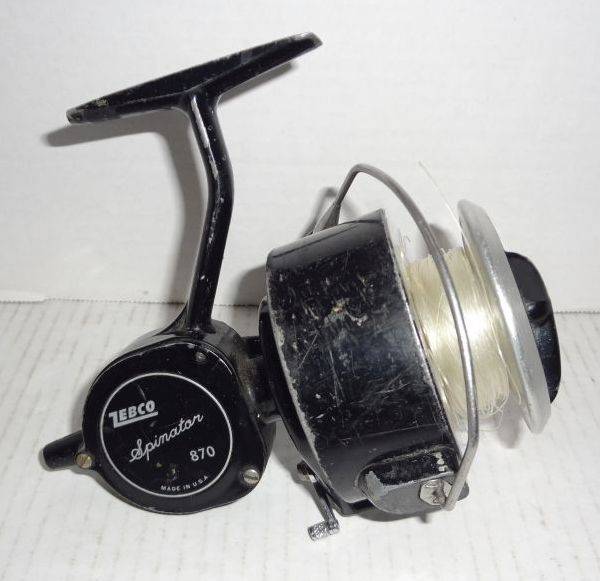 Vintage Zebco Spinator 870 Spinning Reel, Seems To Be In Good Condition  From Estate, Untested, 6W x 6 1/2Tall With Handle Auction