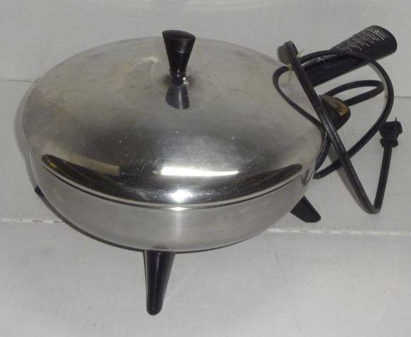 Sold at Auction: FARBERWARE STAINLESS STEEL ELECTRIC FRYING PAN