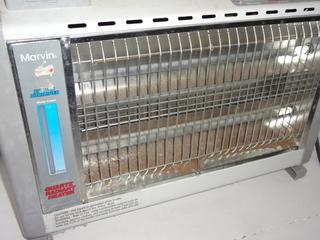 Marvin Quartz Radiant Heater, Water Tank on Bottom Generated Humidifier,  Model 4940, Works Great, Good Condition, 20W x 6D x 16H Auction | 1BID