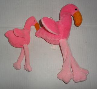 Two Vintage Ty Flamingo Beanie Baby Plush Animals 1993 And 1995 Larger One Still Has They Look Cute Sitting On A Shelf With Leg Dangling Over Very Good Condition Up To