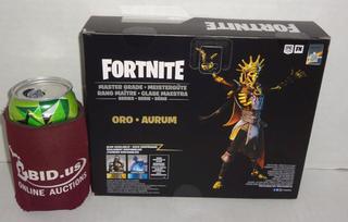 Fortnite Oro (Master Grade) Figura Articolata 10,2 Cm Con Back Bling E Armi - Action Figure Ufficiale Da Collezione
