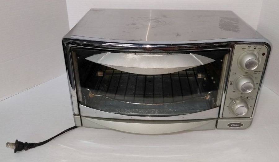 Sold at Auction: Oster Microwave Oven