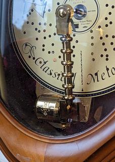 Small World Rhythm Disc Organette Wood Framed Wall Clock, Very