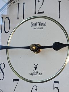 Small World Rhythm Disc Organette Wood Framed Wall Clock, Very