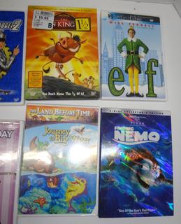 12) DVD's- Home Alone, Home Alone 2 Lost in NY, Home Alone 3, Land Before  Time, Shrek, Shrek 2, Finding Nemo, Elf, Lion King 1 1/2, Inspector Gadget  2, Snow Dogs, Freaky