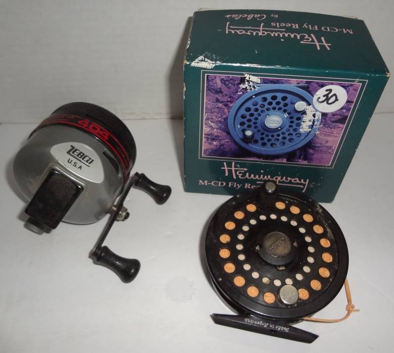 Two Fishing Reels, One Zebco 404, Closed Face And One Hemingway M