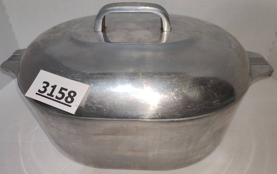 Sold at Auction: Wagnerware Magnalite Roaster Dutch Oven with Rack