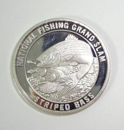 1 Troy Oz. .999 Silver Coin Round North American Fishing Club Striped Bass,  .999 Fine Silver is Stamped, Tested, Guaranteed, Collectible Near Mint  Condition, 39 MM Diameter, 3 MM Thick, 31.35 Grams Auction